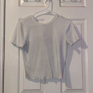 White short sleeve crop top with pink bow detail